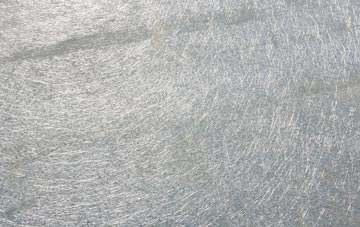 Over Norton laminate fibreglass or shingles?